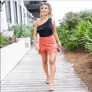 Kittenish fringe skirt